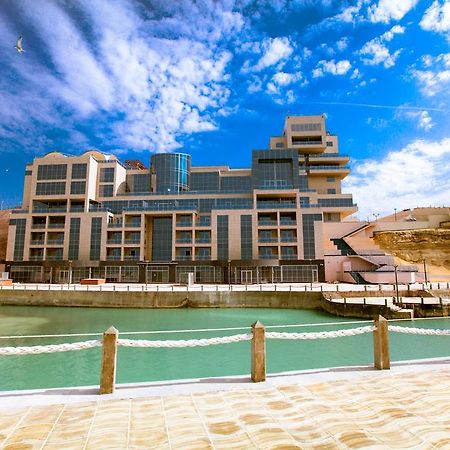 Caspian Riviera Grand Palace Hotel Актау Екстер'єр фото The new building of the University of Jordan